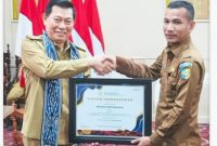 Wakil Bupati Boltara terima penghargaan sebagai terbaik ke-3 se-Sulawesi Utara dalam kategori total capaian pelayanan Keluarga Berencana (KB) tingkat Provinsi
