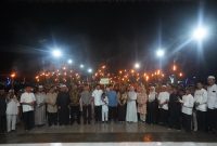 Pemerintah Kabupaten Bolaang Mongondow Utara (Bolmut) menggelar Pawai Obor yang dipusatkan di Lapangan Kembar Boroko