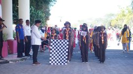 Bupati Boltara Melepas Peserta Gerak Jalan dalam Rangka HUT ke-80 RI