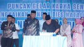 Asisten Bidang Perekonomian dan Pembangunan Setda, Hi. Abdul Mutoh Daeng Mulisa, S.Pd., MM, menghadiri kegiatan Puncak Gelar Karya Seni yang dirangkaikan dengan Dies Natalis ke-21 SMK Negeri 1 Kaidipang