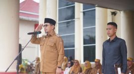 Bupati Bolaang Mongondow Utara (Boltara), Dr. Sirajudin Lasena, SE., M.Ec.Dev, memimpin apel perdana aparatur sipil negara (ASN) pasca libur dan cuti bersama Natal dan Tahun Baru 2026