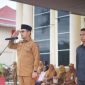 Bupati Bolaang Mongondow Utara (Boltara), Dr. Sirajudin Lasena, SE., M.Ec.Dev, memimpin apel perdana aparatur sipil negara (ASN) pasca libur dan cuti bersama Natal dan Tahun Baru 2026