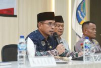 Bupati Bolaang Mongondow Utara, Dr. Sirajudin Lasena, SE., M.Ec.Dev