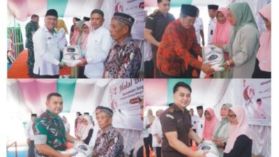 pemerintah  menyalurkan bantuan beras  pangan kepada masyarakat