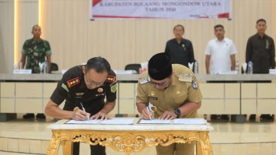 penandatanganan perjanjian kerja sama antara Pemkab Boltara dan Kejaksaan Negeri Boltara